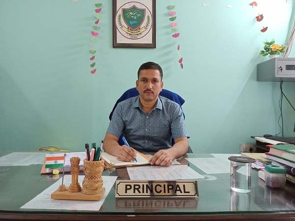school principal at desk